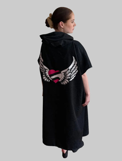 Black hoodie with a winged heart design on a plain background