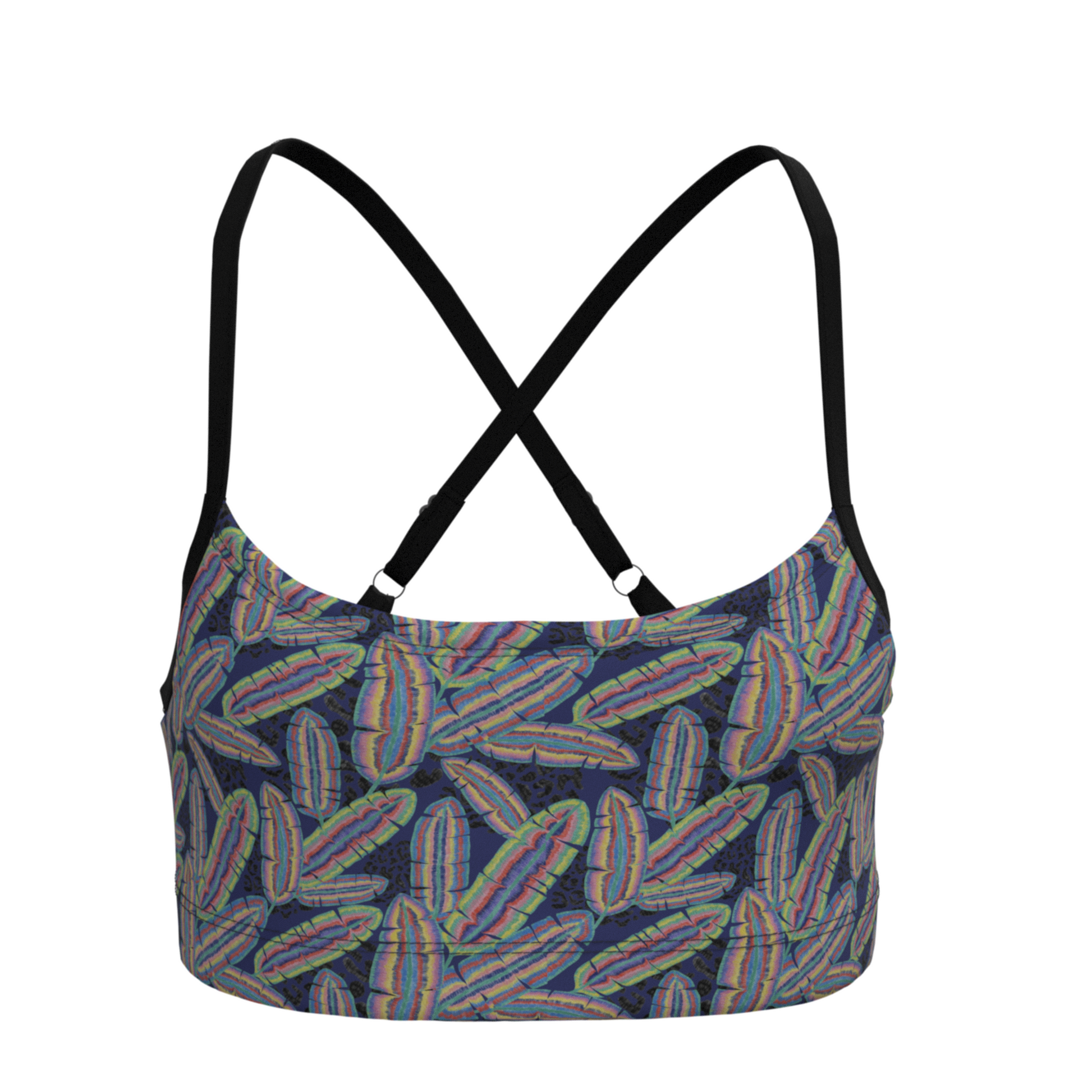 Multicolored leaf patterned top with criss-cross adjustable straps on a white background