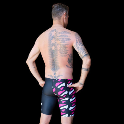 Fit Man wearing Heart and Black pattern Jammers standing with hands on hips
