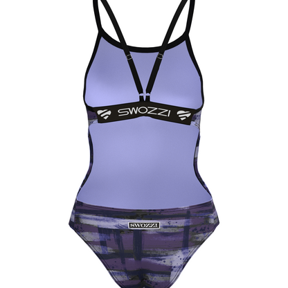 Purple swimsuit with black straps and 'Swozz' branding on a white background